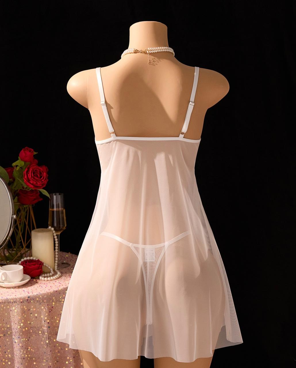 Ensemble deux pièces (nuisette + string)
Tissu doux et léger